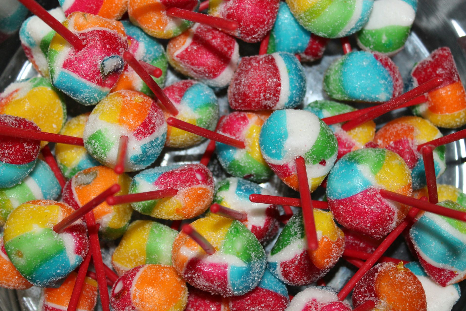 A pile of colorful candies sitting on top of a table